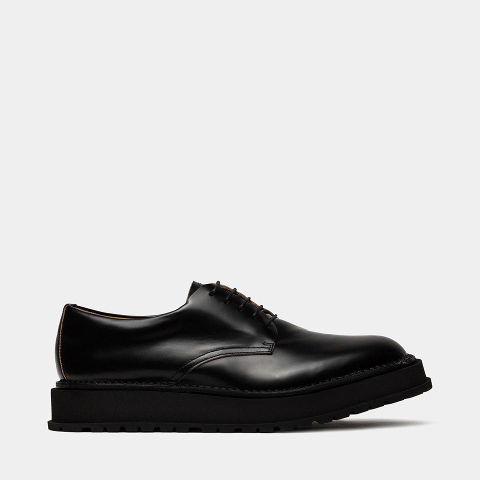 BUTTERO: CHAUSSURE DERBY AEDI EN CUIR NOIR BROSSE