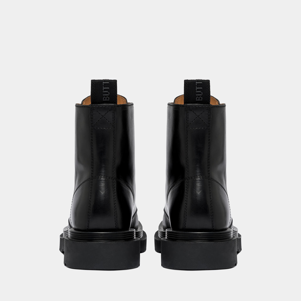 BUTTERO: STORIA COMMANDO BOOTS IN BLACK LEATHER