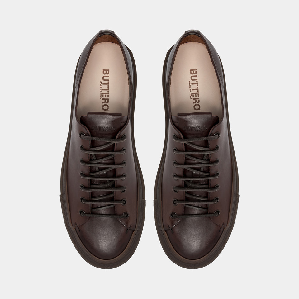 BUTTERO: TANINO SNEAKERS IN EBONY LEATHER