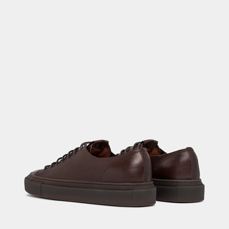 BUTTERO: TANINO SNEAKERS IN EBONY LEATHER