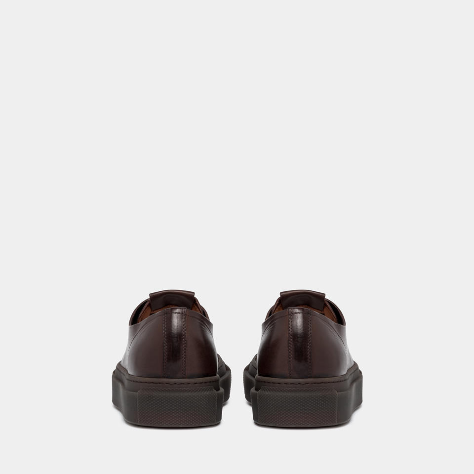 BUTTERO: TANINO SNEAKERS IN EBONY BLACK LEATHER